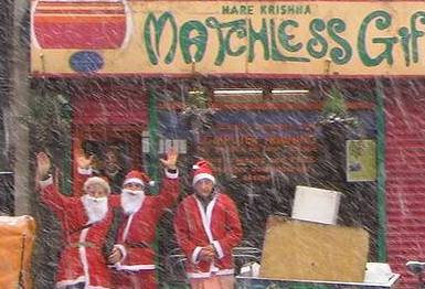 Students brave the snows to get their presents from the Santa clauses of Matchless Gifts! thumbnail